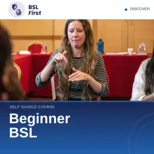 A woman uses British Sign Language in a classroom setting, with the text “Self-guided course: Beginner BSL” overlaid.