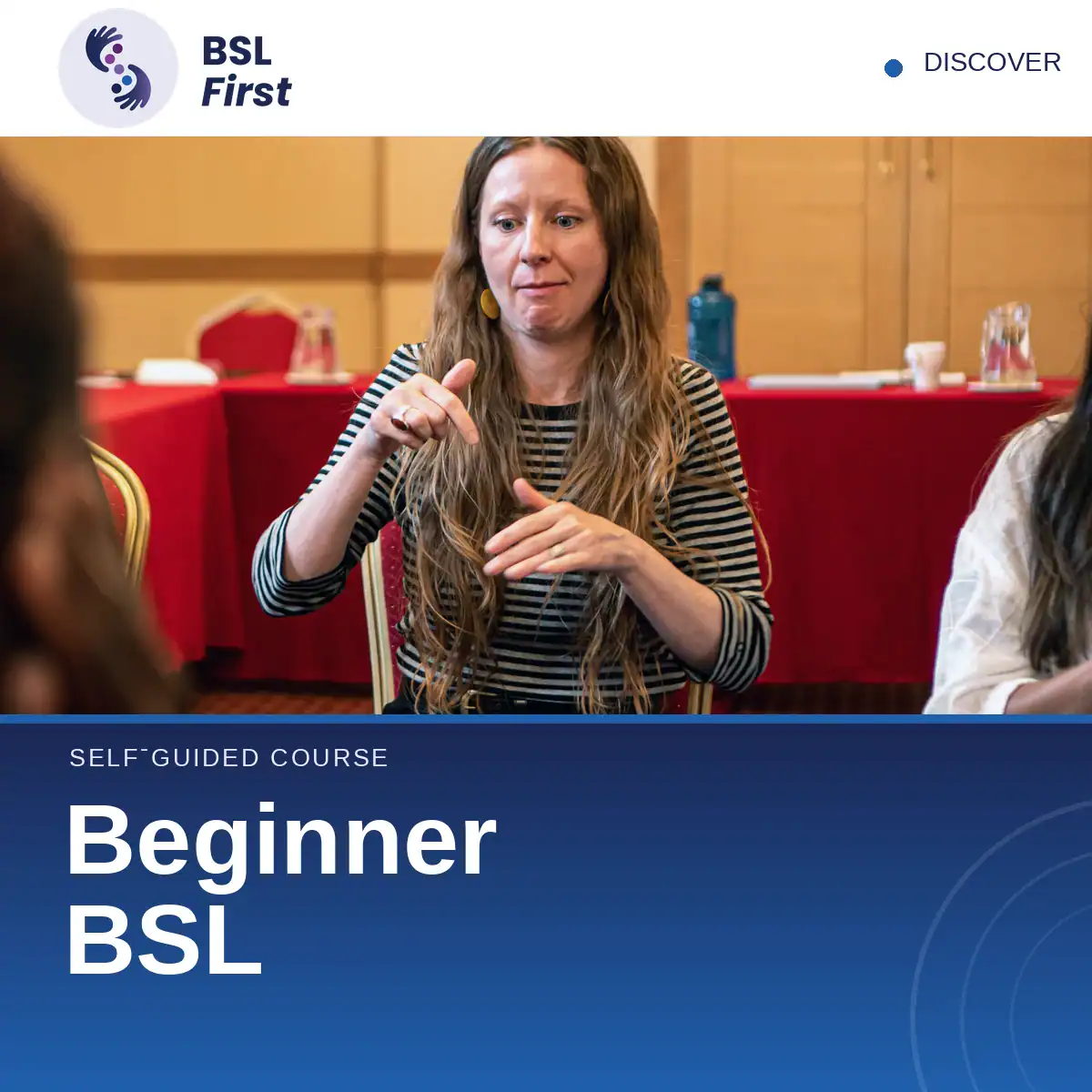 A woman uses British Sign Language in a classroom setting, with the text “Self-guided course: Beginner BSL” overlaid.